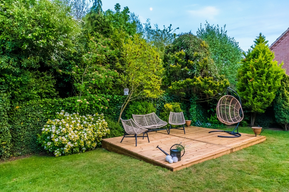 Completed garden maintenance with planting and paving